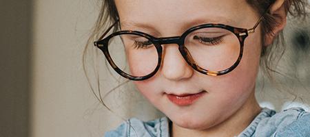 PICTURE OF GIRL REVIEWING FORMS