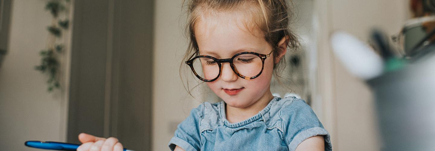 PICTURE OF GIRL REVIEWING FORMS